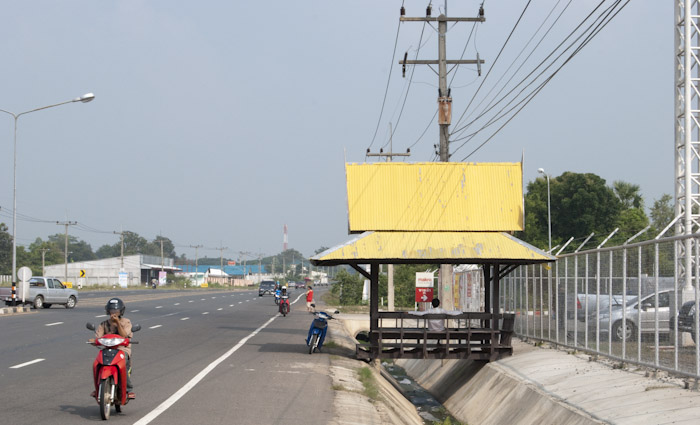 bus stop over drainage ditch