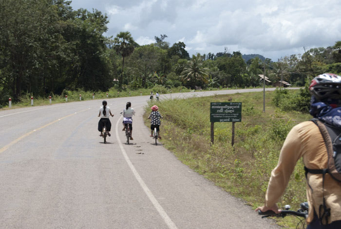 three girls on bicycles