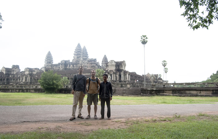 posing with Angkor Wat