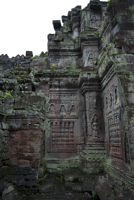 wall with carvings and ragged top