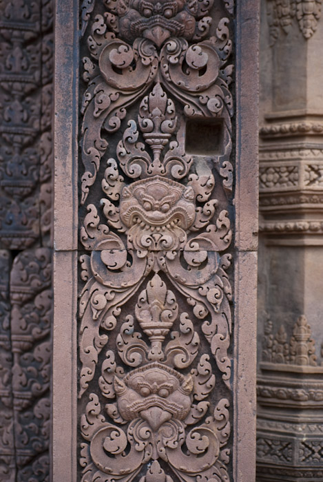 column with faces