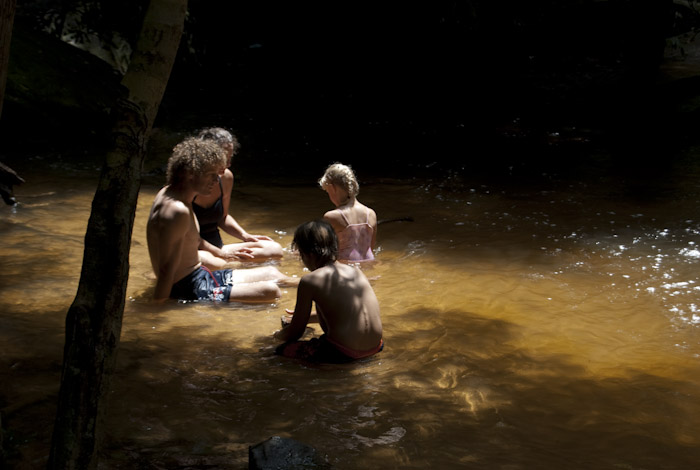 family in river