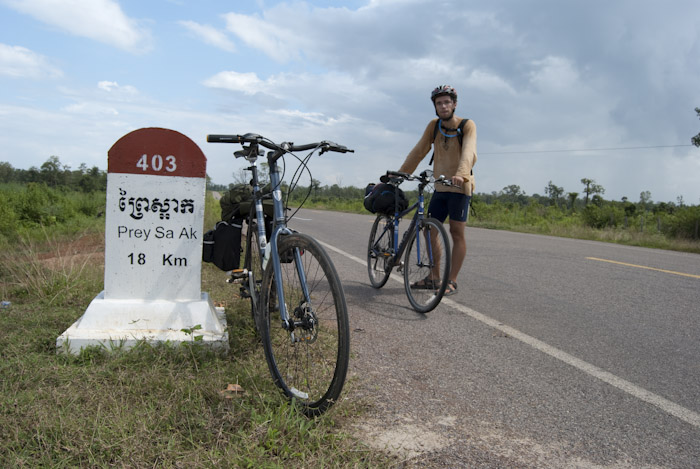 Micah, bikes, and distance marker