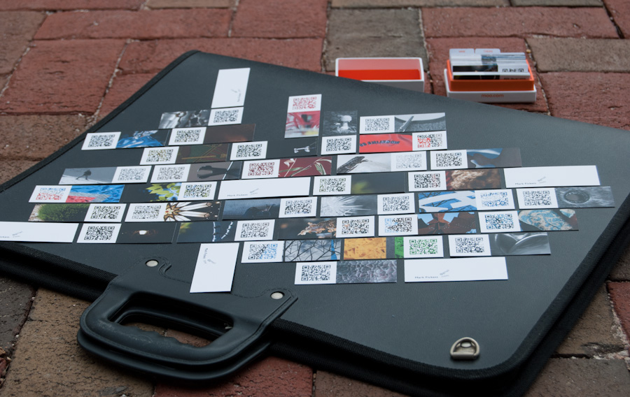 MOO MiniCards laid out on portfolio, on bricks